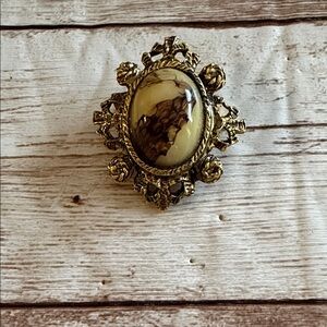 Vintage Gold Tone Brooch with Brown Center piece